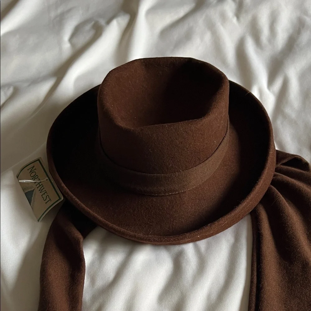 Northwest Territory 100% wool dark brown hat with ear flaps that tie at the neck